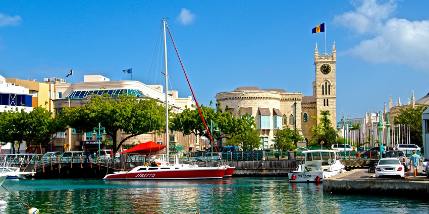 A stunning view of the Barbados with turquoise waters and lush green cliffs