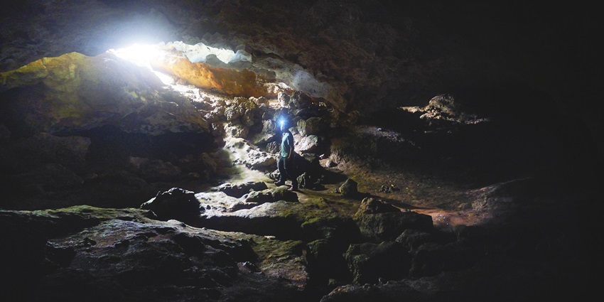 A serene view of the famous Bat Cave exuding old-world charm and rustic details.