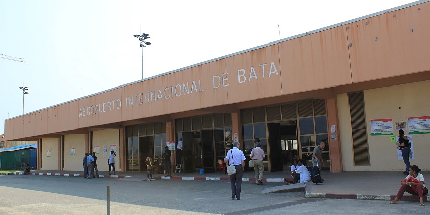 Bata International Airport features a runway, terminal buildings, and parked aircraft