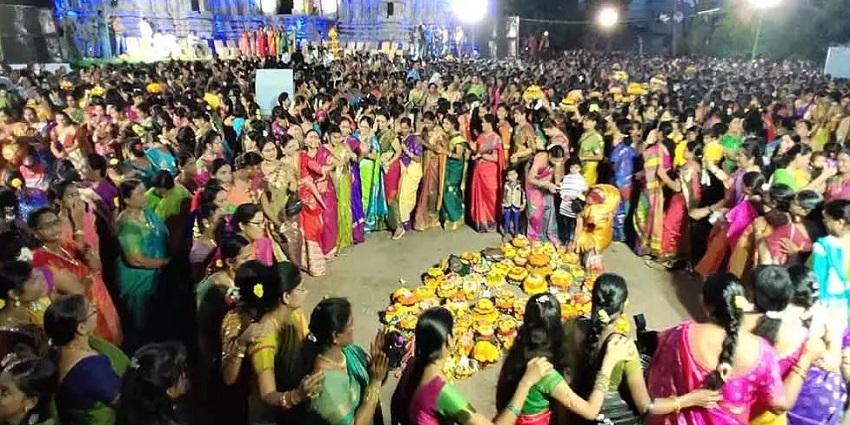 An image showcasing the vibrant and colourful celebrations of the Bathukamma festival.