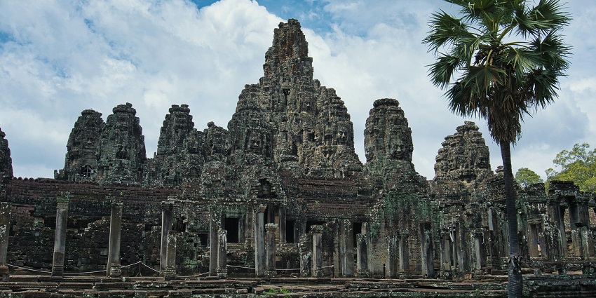 A scenic view of the rustic Bayon Temple, one of the top places to visit in Siem Reap.