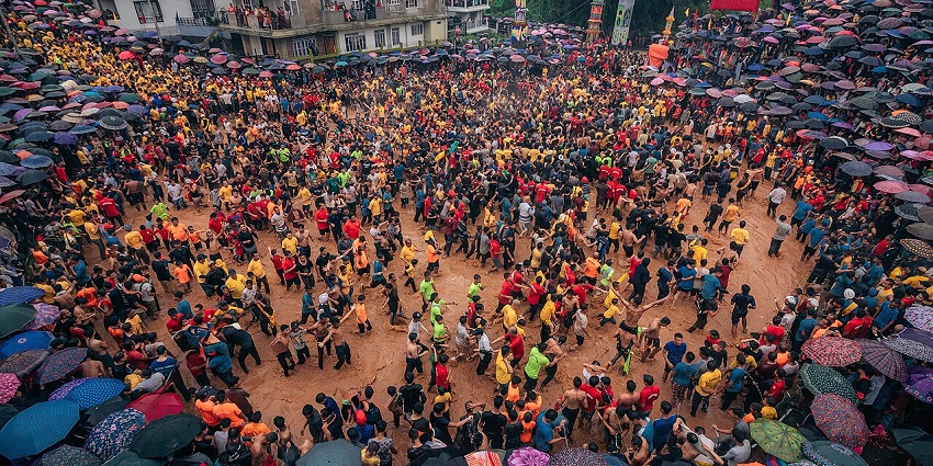 A crowd at the Behdienkhlam Festival, celebrating with traditional rituals and dances.