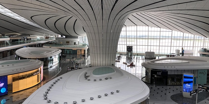 Passengers exploring inside Beijing Daxing International Airport, one of the airports in Beijing