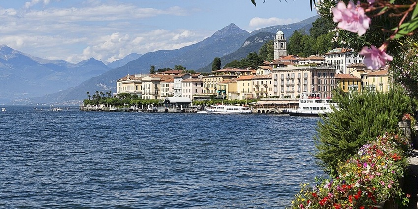 Beautiful lakeside view of Bellagio, colorful buildings along the shores of Lake Como.