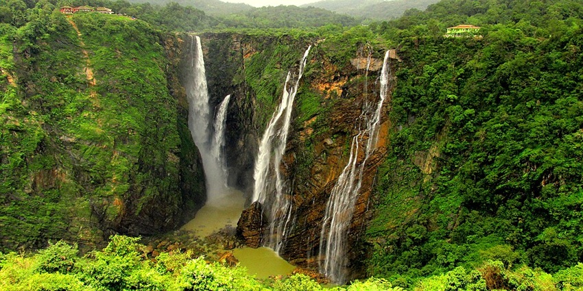 The segmented streams of Jog Falls plunging from a great height into a rocky basin.