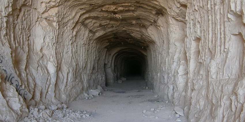 An image showing a prehistoric cave structure like Blombos Cave in South Africa.