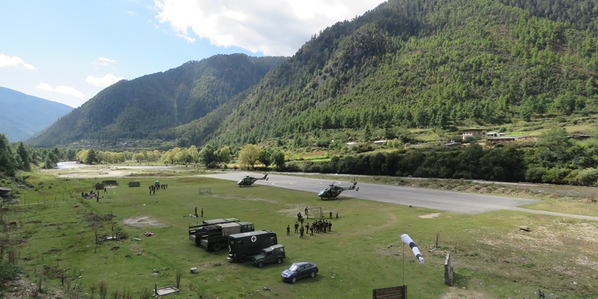 An image showing agricultural fields and forested slopes in the Haa Valley region of Bhutan.