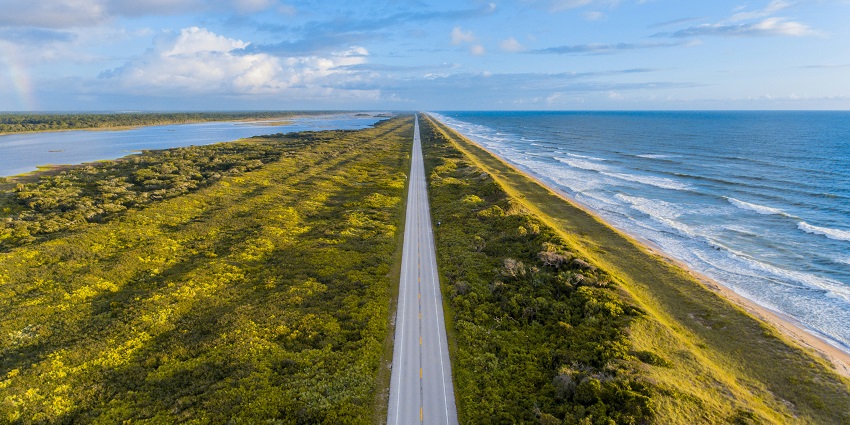 A bright summer day on the Great Ocean Road with clear skies and scenic views.