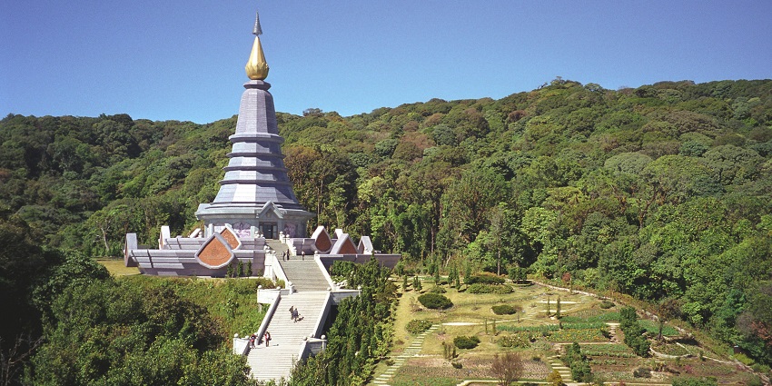 An image showing Chedi Doi Inthanon in Chiang Mai, with a pagoda and surrounding hills