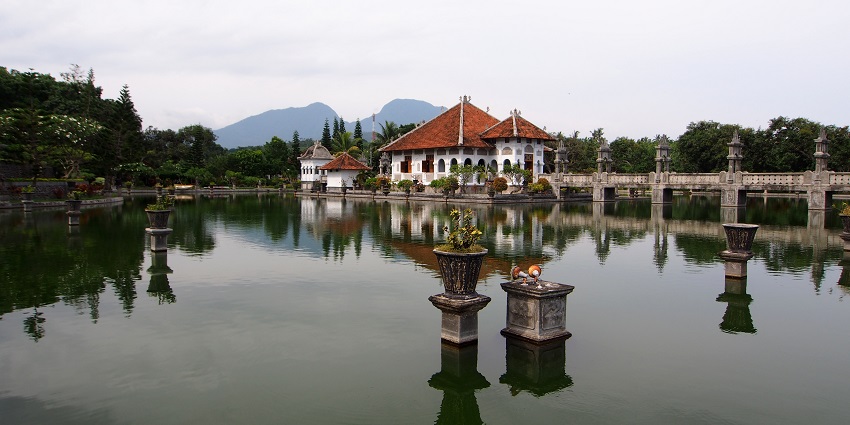 Picturesque view of Taman Ujung , with the vibrant colors reflecting off the water.