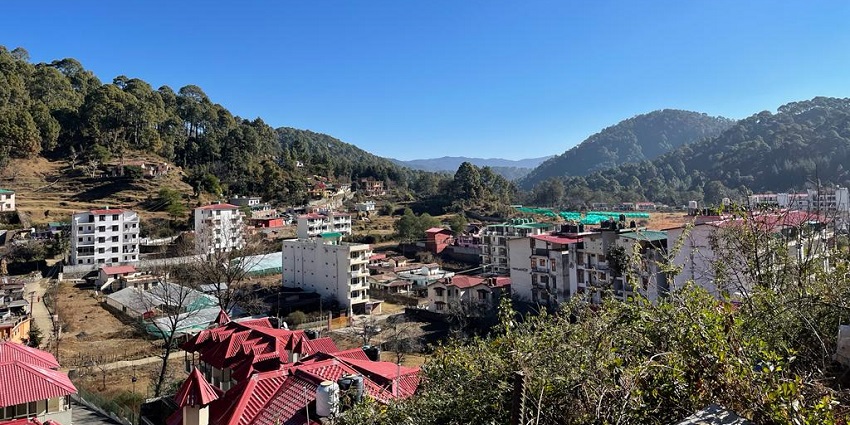 A peaceful sunrise near Dunagiri Temple, offering scenic mountain views.
