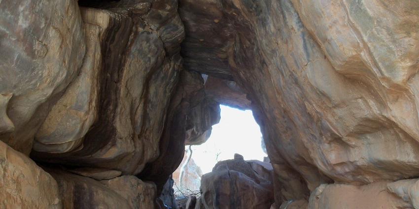 The Bhimbetka Caves, near Ratapani Wildlife Sanctuary, feature ancient rock paintings