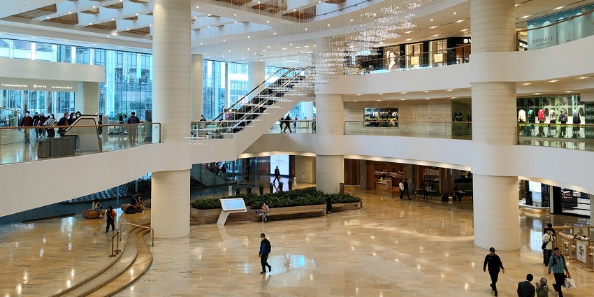 A view of the Big C Supercenter featuring various stores with international brands.