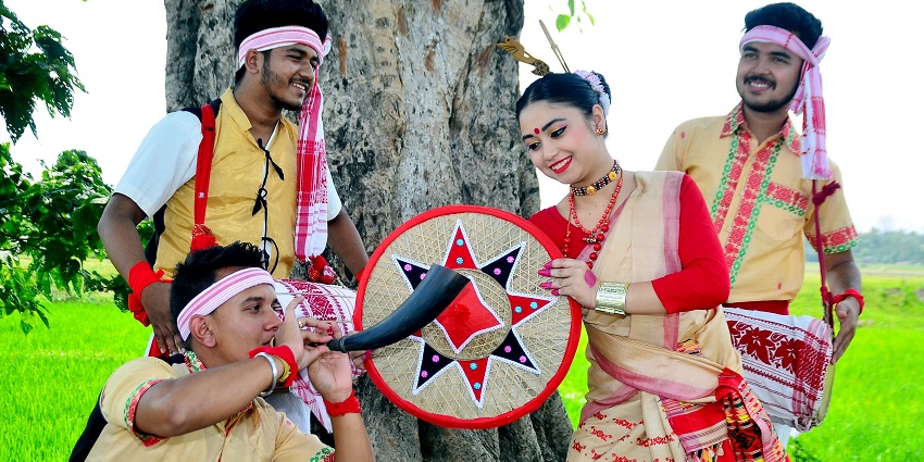 An Image of people dancing and celebrating Bihu, known as one of the crop festivals in India.