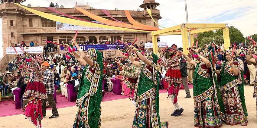 An image showing the Bikaner Camel Festival with decorated camels and cultural performances