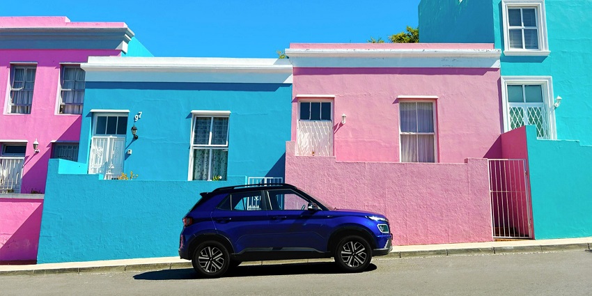 An image of multicoloured houses, of Bo-Kaap city, one of the places to visit in Cape Town.