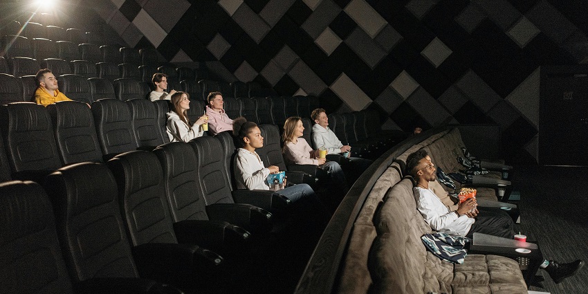 An image of a group of people enjoying watching a movie at the BYOFF in India.