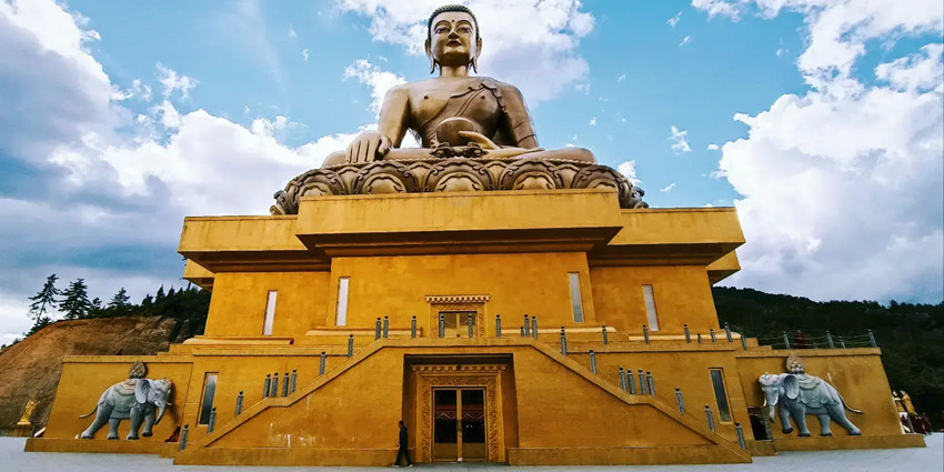 A glimpse of the majestic Buddha Dordenma, a tourist attraction near Dechencholing Palace.