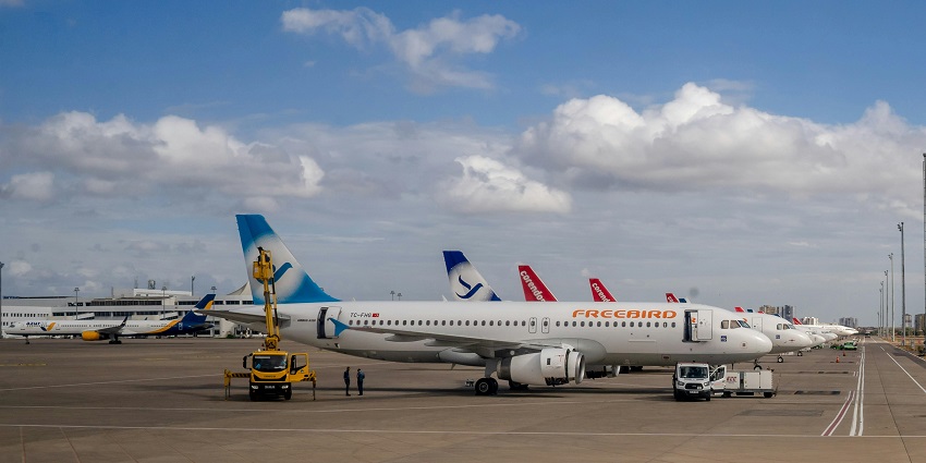 Commercial aeroplanes parked on the runway of an airport in Papua New Guinea