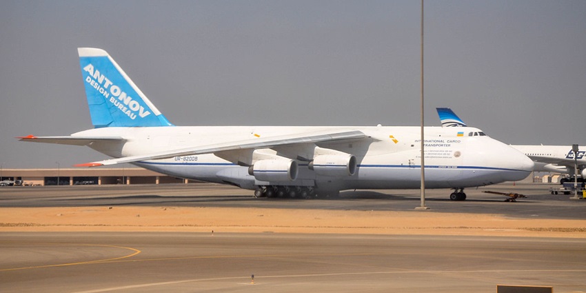 An Antonov cargo aircraft is standing on the airport apron awaiting loading operations