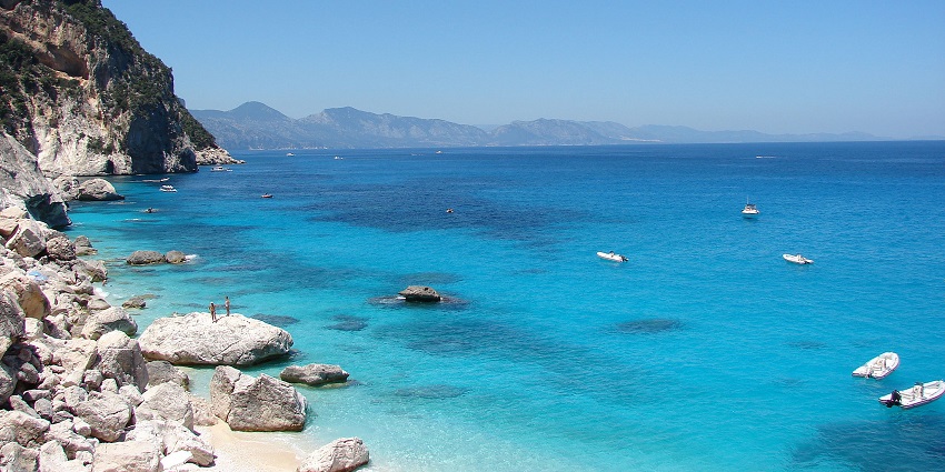 Cala Goloritzé is among the top bikini beaches in the world with turquoise waters, dramatic limestone cliffs, and a secluded shoreline.