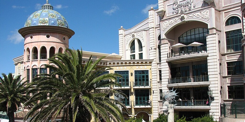 An image showing Canal Walk Shopping Centre, a large retail hub with various stores and eateries.