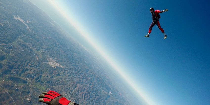 Experience skydiving in South Africa with views of Table Mountain and Robben Island.