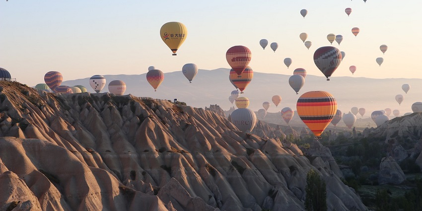 A stunning view of the hot air balloon ride during sunset in Cappadocia in Turkey