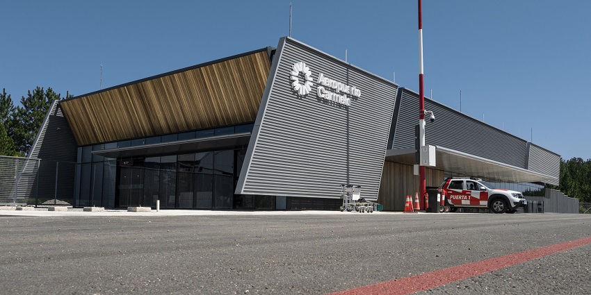 Carmelo International Airport with modern designs while a security vehicle parked.