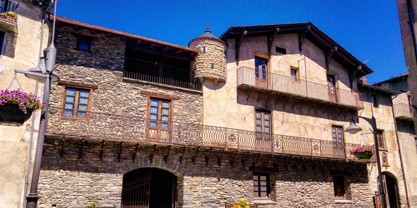 The elegant facade of Areny-Plandolit House, a historic stone mansion in Ordino, Andorra.