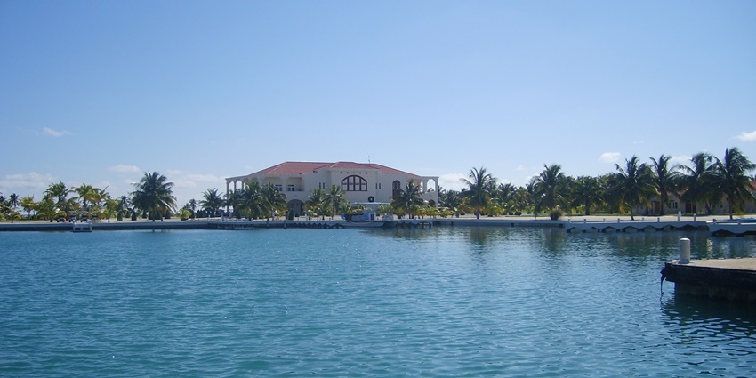 A stunning view of Caye Chapel is a luxurious private island, from a ferry in Belize.