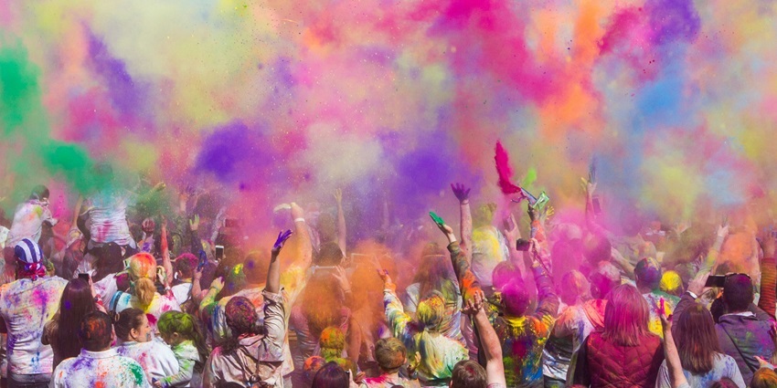 Immerse yourself in Vrindavan’s vibrant Holi festival, where clouds of colourful powders symbolise joy