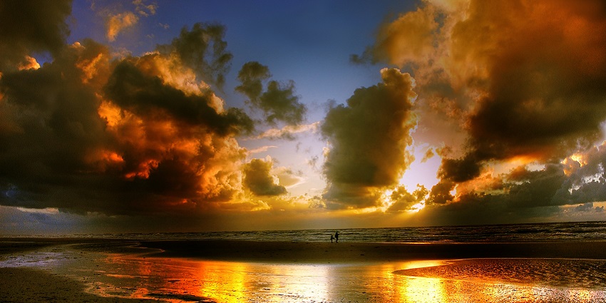 Capture stunning coastal landscapes at Cemagi Beach, featuring black sand.