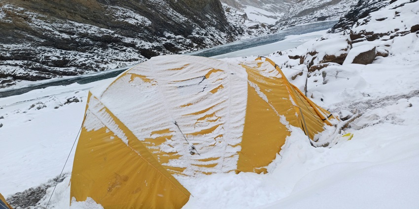 Trekkers walking on the frozen Zanskar River, a unique experience for trekking in October