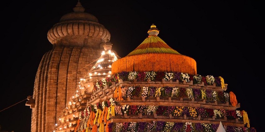 An image showing Taratarini Temple illuminated at night during the Chaitra festival.