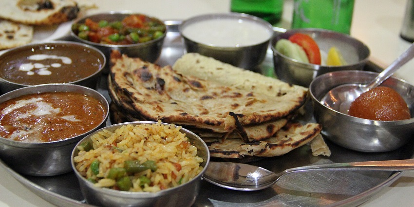 An image showing a traditional dish platter, served during this festival as a ritual.