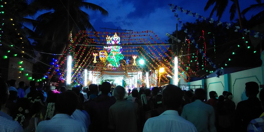 Large crowd gathered outside the temple of Goddess Meenakshi during Chithirai Festival.