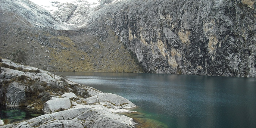 Laguna Churup with crystal-clear waters and rugged mountains, one of the highest lakes in the world