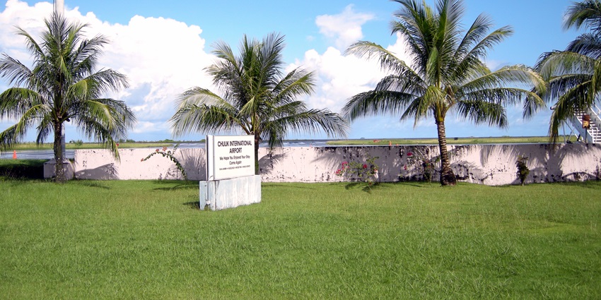 A board at the green lawns of Chuuk International Airport in Weno, Federated States of Micronesia.
