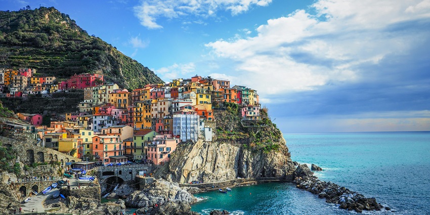 Cliffside trails, colorful seaside villages, and blue Mediterranean views in Cinque Terre.