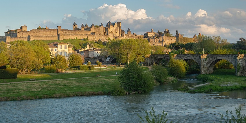 View of the medieval Cité de Carcassonne, Aude River, and Pont-Vieux bridge.