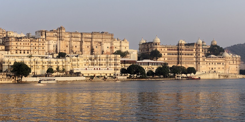The picture of the beautiful city Palace in Udaipur by Lake Pichola in Rajasthan
