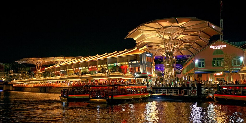 Vew of the famous riverside Clarke Quay located near Gardens By The Bay at night