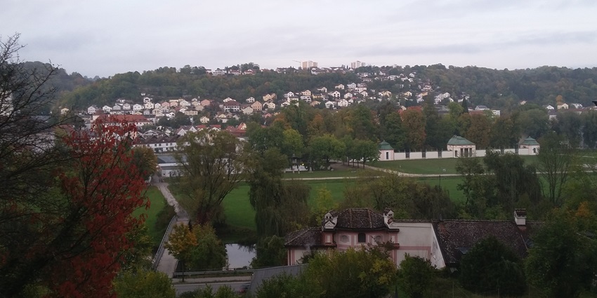 Panoramic view of Eichstätt town from Frauenberg hillside, framed by lush green landscape, one of the best places to visit in Vienna for free.