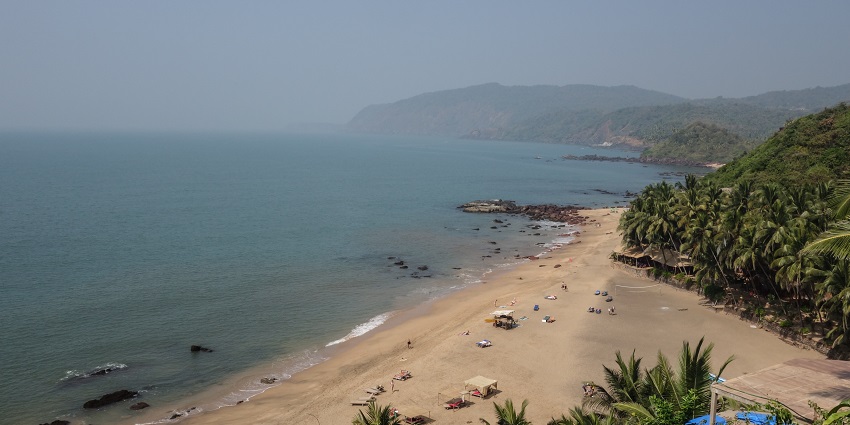An aerial view of Cola Beach featuring sands, one of the top places to visit in Goa.