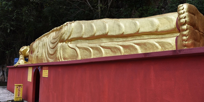 Reclining Buddha at the Da Seng Ngan Temple, one of the temples in Ipoh, Malaysia.