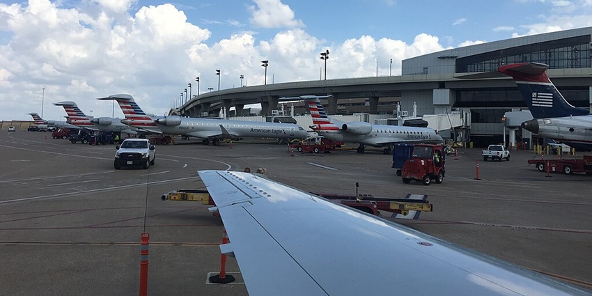 Aerial view of Dallas-Fort Worth Airport’s terminals, runways, and adjacent facilities