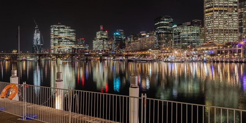 Photo of Darling Harbour, with lively waterfront attractions and city lights.