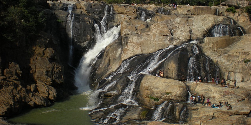 The stunning Dassam Falls where water cascades down rocky terrain with great force.