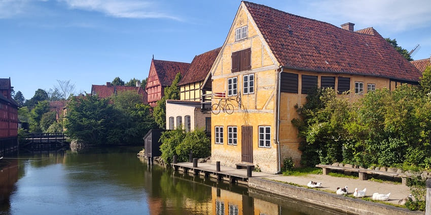 The famous Den Gamle By situated by a small lake at Aarhus Botanical Garden, Denmark.